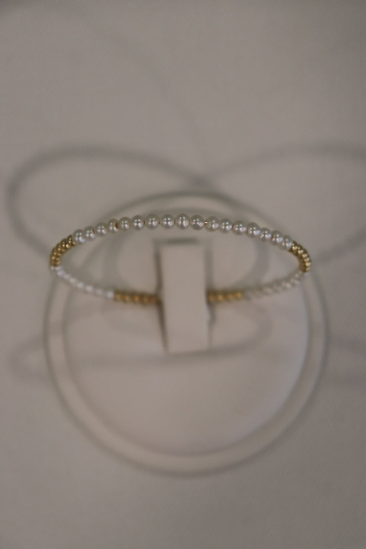 14Karat yellow gold pearl bangle bracelet