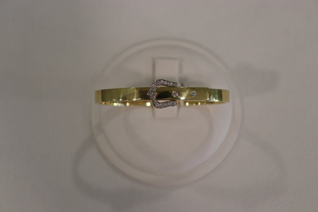 18Karat yellow gold bangle bracelet with diamond buckle