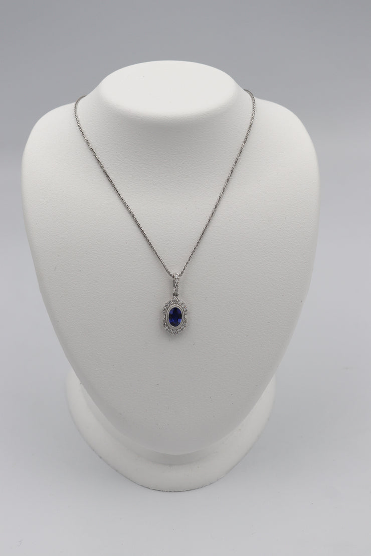 14Karat White Gold Sapphire and Diamond Pendant.