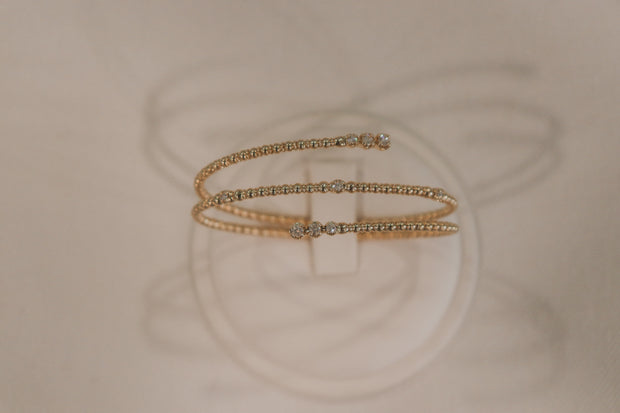 14Karat yellow gold spiral bracelet with diamonds